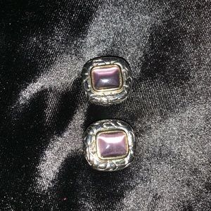 Silver colored clip on earrings with purple stone